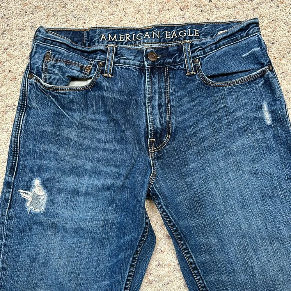Good used condition American eagle factory distressed bootcut jeans. - Picture 7 of 11